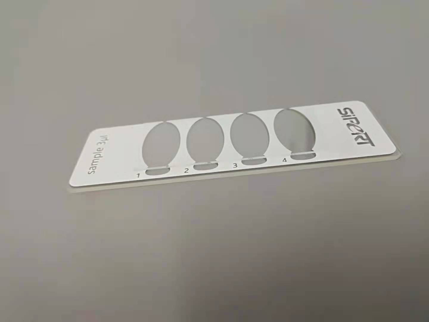Disposable four-cavity slide